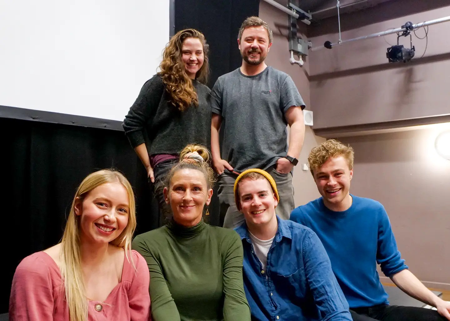 The Yarns From Hyem creative team, a group of six young men and women smiling.